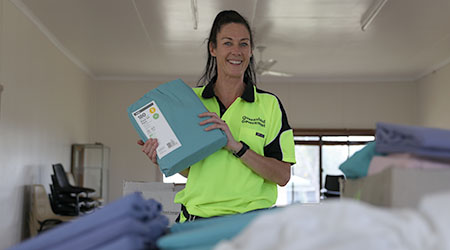 An image of Public sector employee in a laundry facility